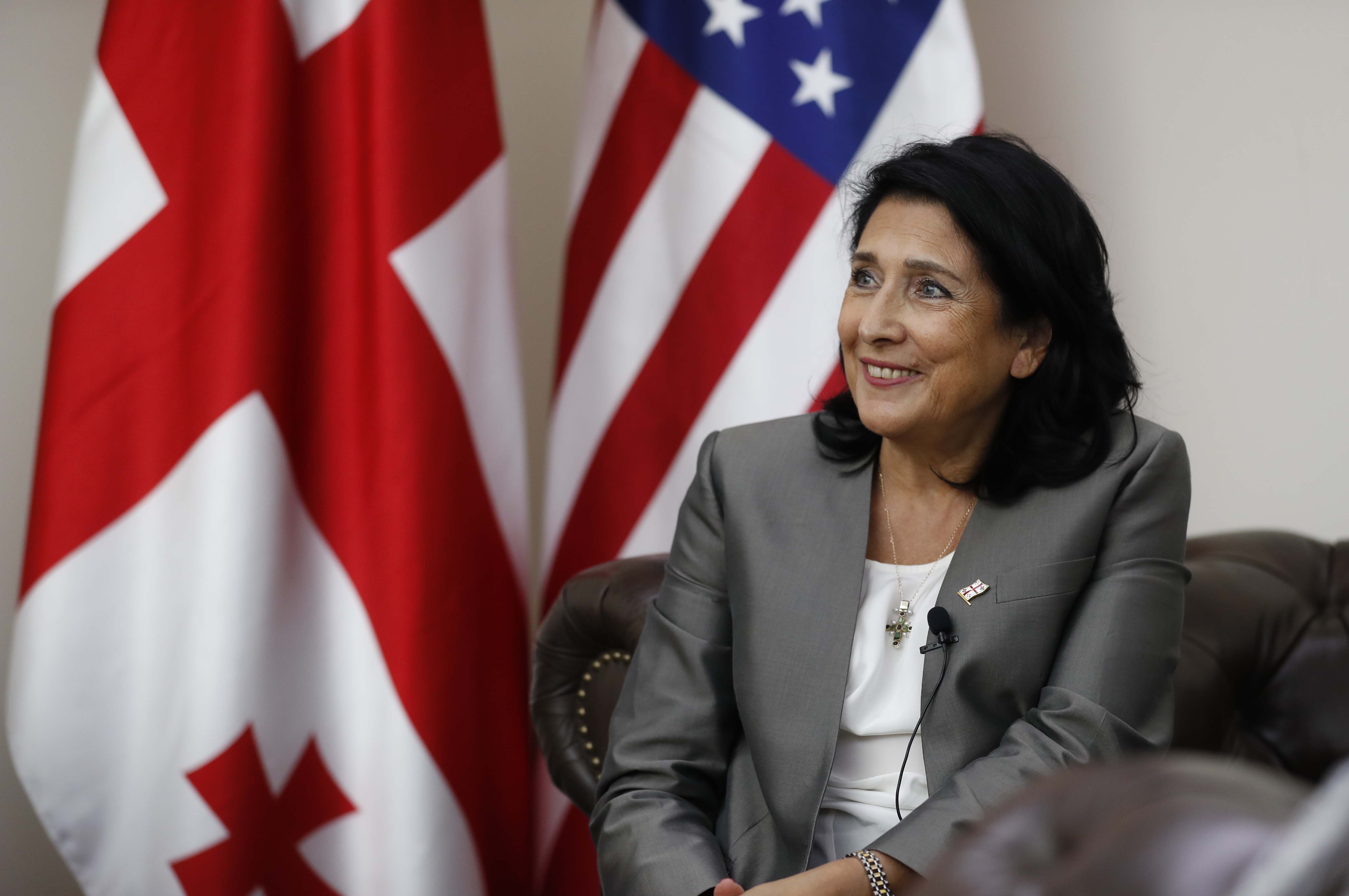 Salome_Zourabichvili_with_Georgian_and_U.S._Flags_background
